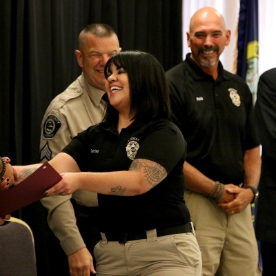Law Enforcement students celebrate graduation with family and friends during a ceremony on May 16.
