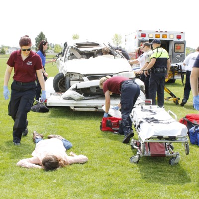 Advanced EMT students demonstrating accident at high school.
