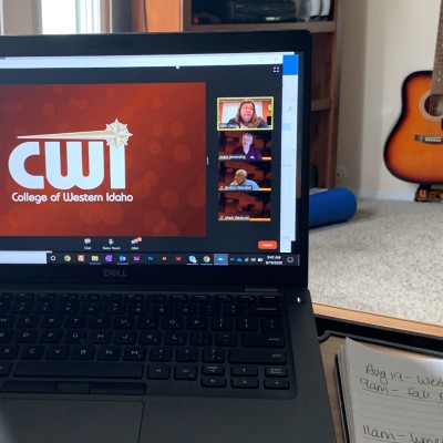 An employee's view as they watch the 2020 College Address from home