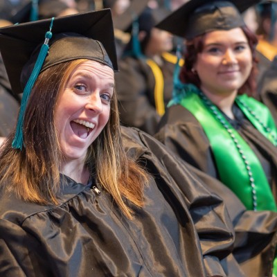 Student smiling during graduation