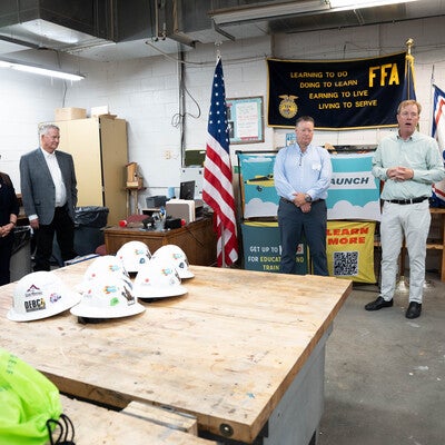 Leaders address students at an event.