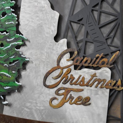Metal Christmas tree, Idaho, and Snowflake artwork for Capital Christmas Tree