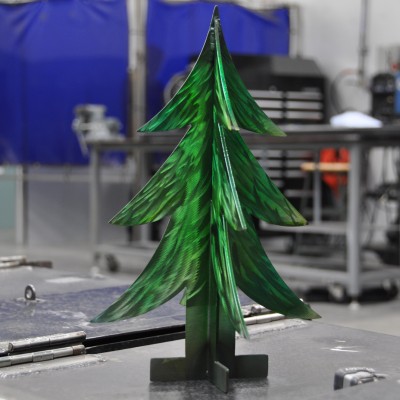 CWI faculty created table-top metal Christmas trees for display at the lighting ceremony.