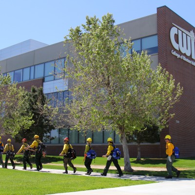 Firefighters walking outside the CWI campus