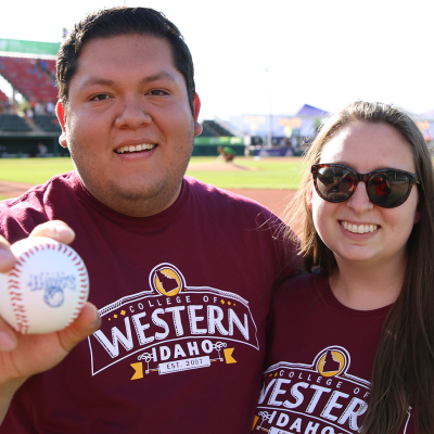 Juan Gurrola and his wife at CWI Night at the Boise Hawks