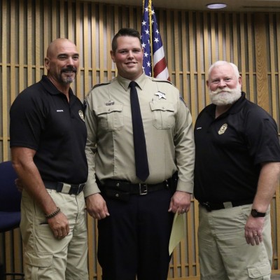 Reid and LeRoy Forsman with former student, Josh Argyle, the day he was sworn in as a deputy