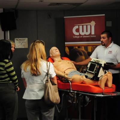 Instructor giving a emergency medical services demonstration.
