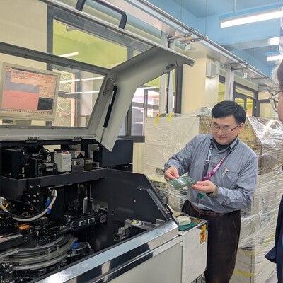 Person working a semiconductor