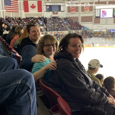 CWI student, Elizabeth Carter, and guests enjoying the Steelheads game