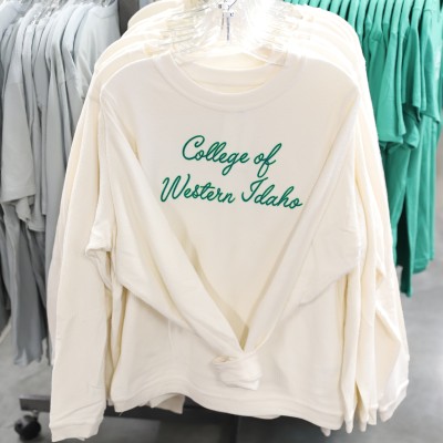 College of Western Idaho cream colored long sleeve shirt