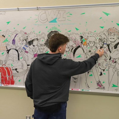 Chereji drawing at NCAB with whiteboard markers