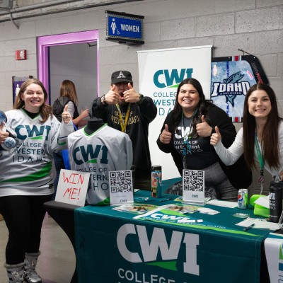 CWI admissions team with student