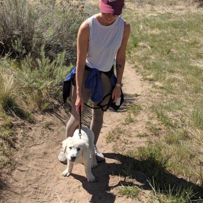 April 21-day challenge participant, Maggie Saye, hiking with her dog, Murphy.
