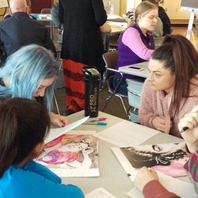 Students creating art during Muse: A Poetry Workshop at College of Western Idaho