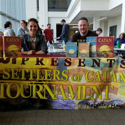 Students at Settlers of Catan Tournament table