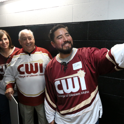 CWI staff and leadership posing for a selfie during CWI Night at the Idaho Steelheads