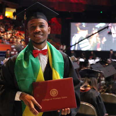 2019 CWI graduate with diploma at Commencement