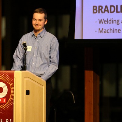 CWI student Bradley Dougal speaks during the Opening Doors Benefit Event.