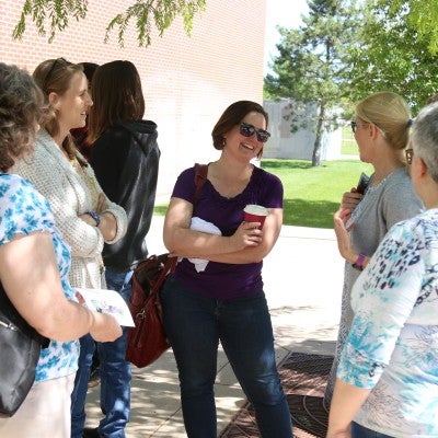 Family and friends gather to celebrate Joyce Bair at the Nampa Campus Academic Building.