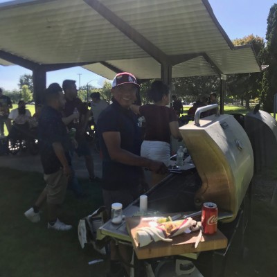 Staff cooking carne asada at Carne Asada en el Parque Wednesday, June 19, 2019.