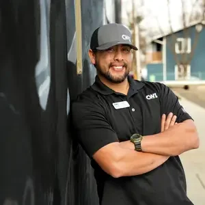 Jared Lopez leans on a wall