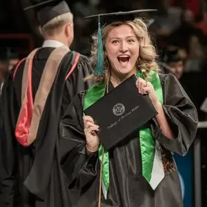 Person holding their diploma