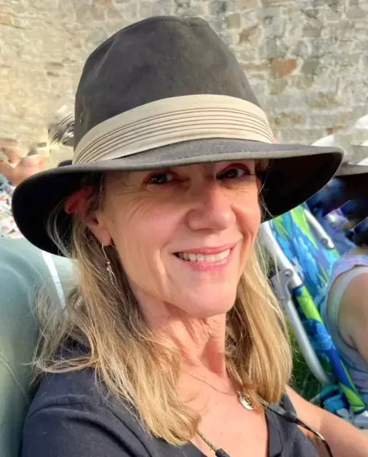 A photo of a smiling woman