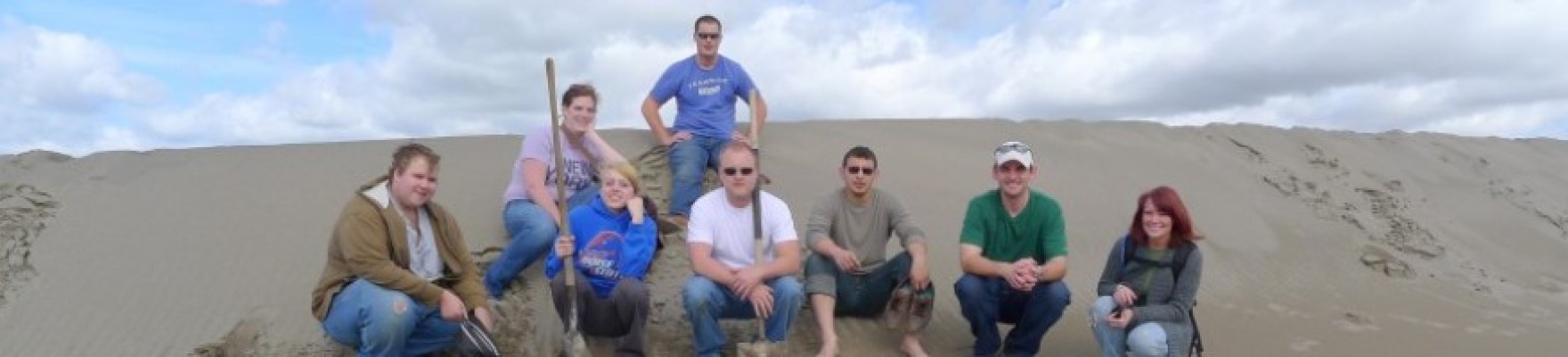 Students on sand dune