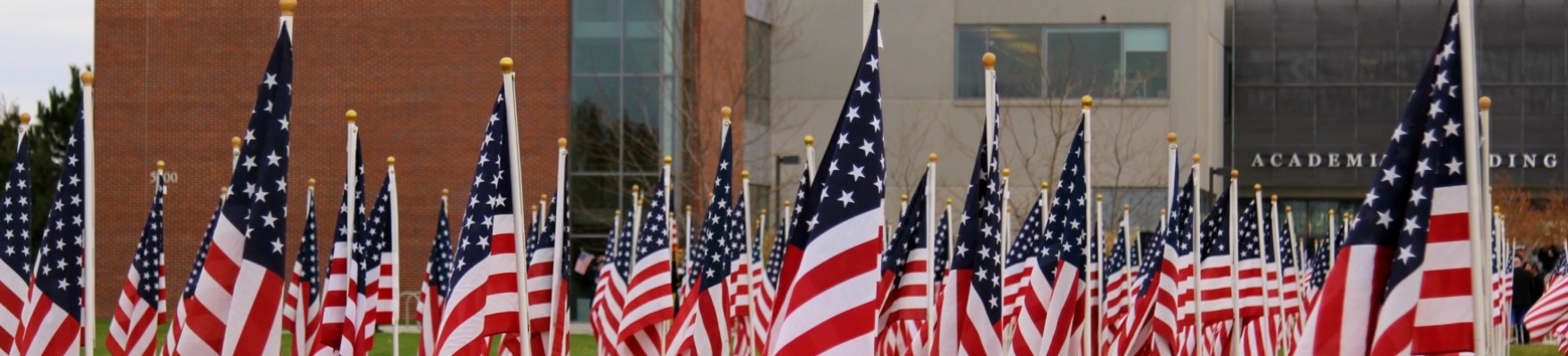 Veteran's Day flag display in front of the CWI Nampa Campus Academic Building.