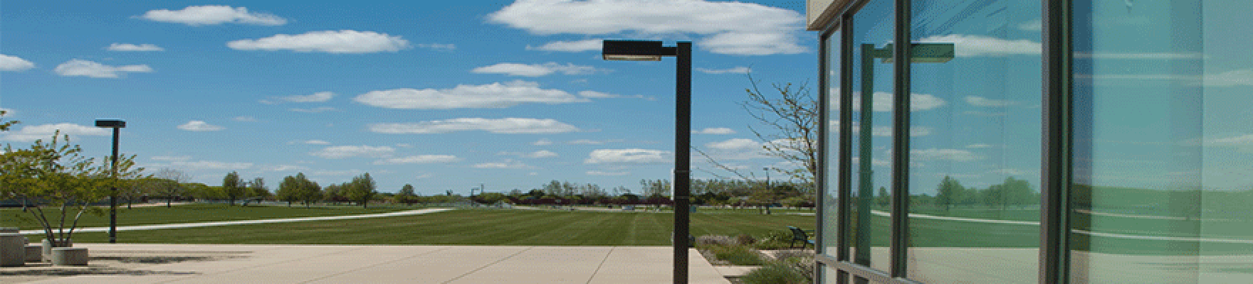 View of grass field from the front of the Nampa Academic Building