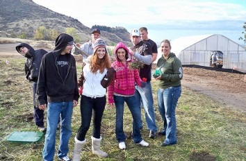 Students outside of the greenhouse
