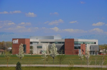 Nampa Campus Academic Building exterior picture with a blue sky and few fluffy clouds.