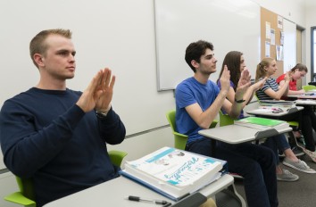 Sign Language students practicing signing.