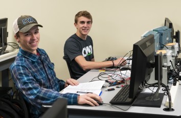 Students working on computer in clasroom