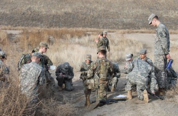 Military science students conducting a briefing during training