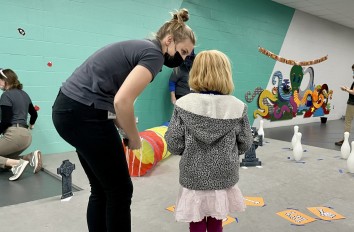 Occupational Therapy Assistant student working with a child