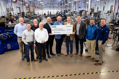 Bank of Idaho check presentation to the CWI Foundation in a lab on campus