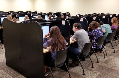 people taking tests in the testing center