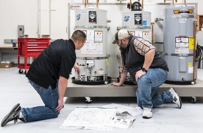 Student and instructor in an HVAC lab