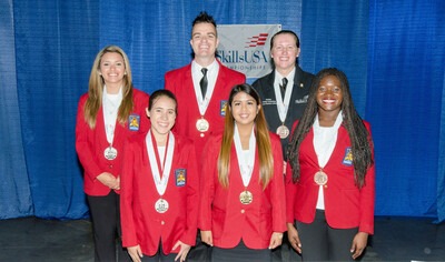 SkillsUSA competitors showing off medals after a competition