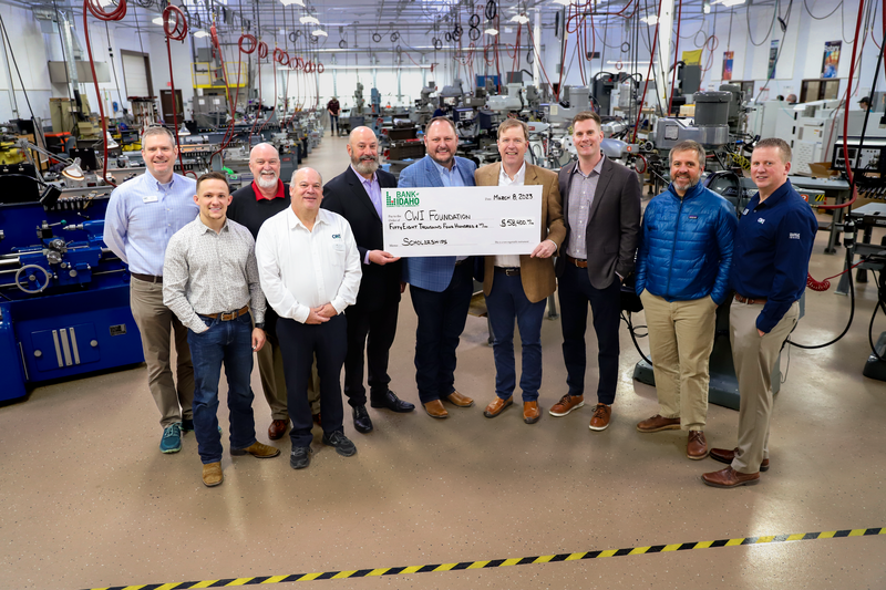 Bank of Idaho check presentation to the CWI Foundation in a lab on campus