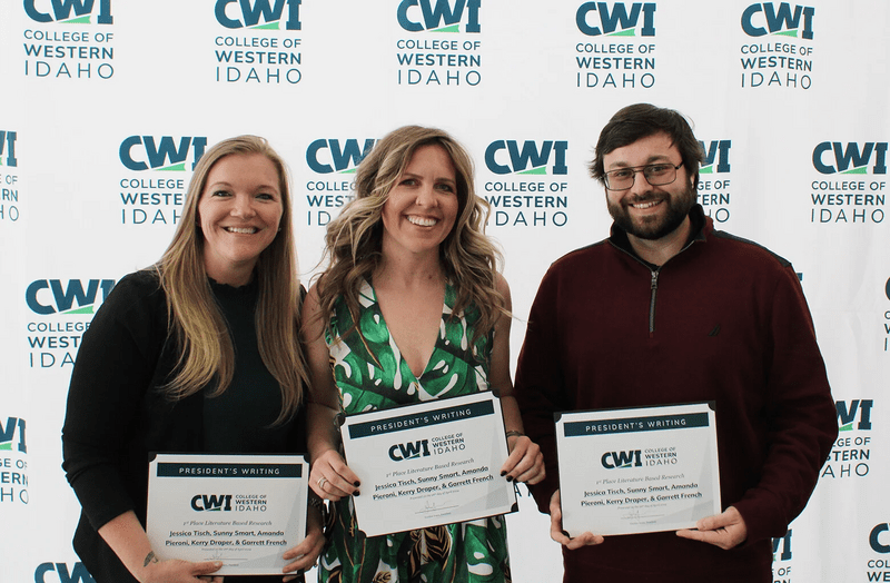 Three students with their awards