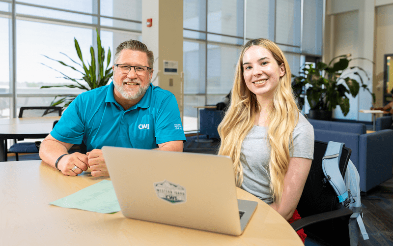 Student meeting with Advisor in lobby