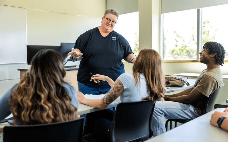 Instructor in front of students in classroom