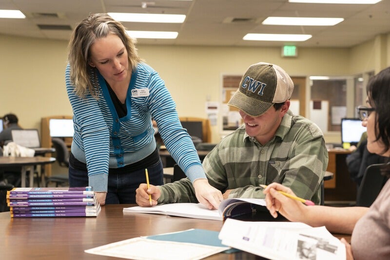 Students and a teacher in the Nampa Adult Education lab