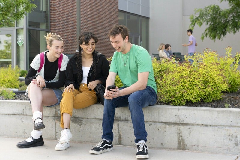group of students outside Nampa Campus Academic Building