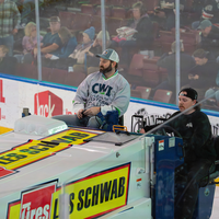 Person in CWI gear rides Zamboni 