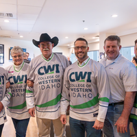 Group of people with CWI hockey jerseys