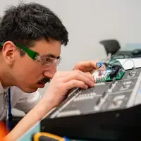 Student working on control system
