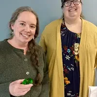 Two people standing together